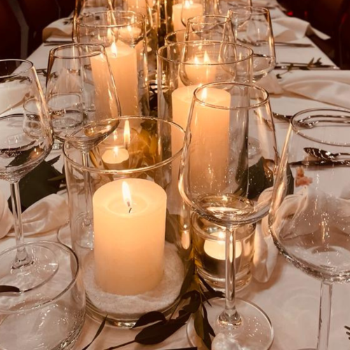 Windlicht met kaars en decoratiezand